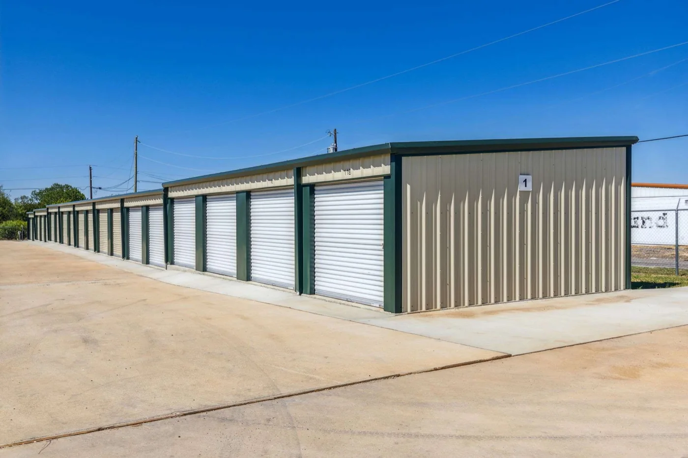 Storage buildings with drive-up units at McCreary Rd