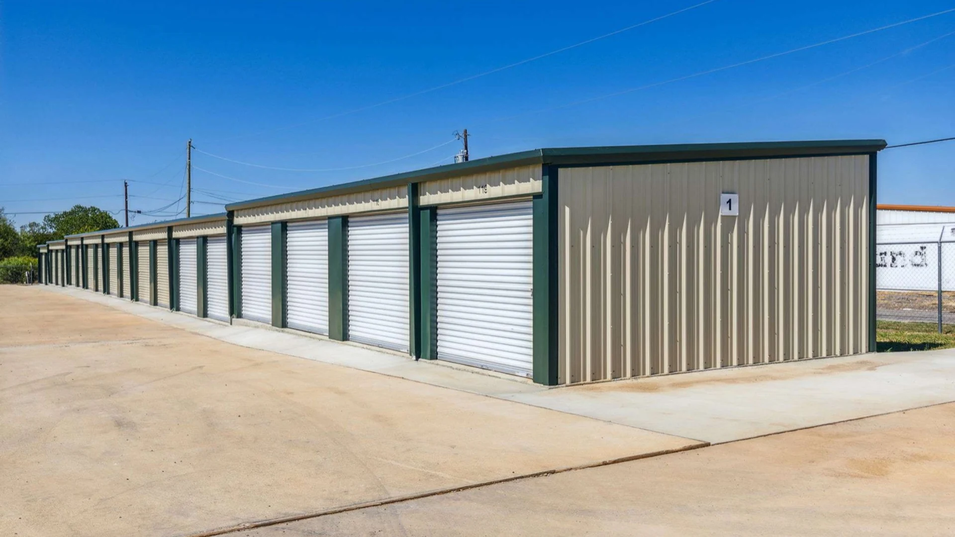 Storage buildings with drive-up units at McCreary Rd
